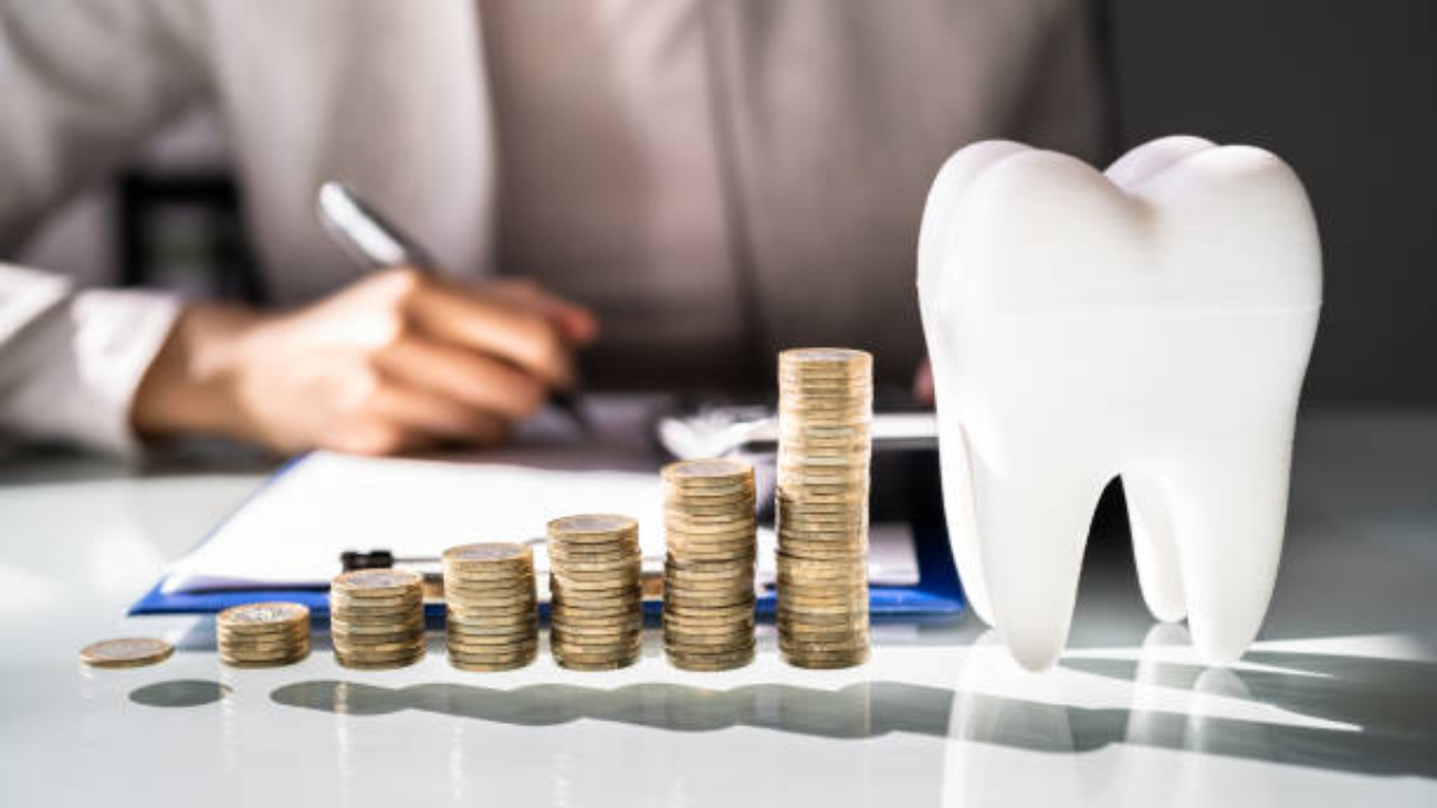 Dental Implant Bill And Financing. Dentist In Clinic